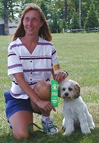            Molly & "Rylee",
a Sable & White Cockapoo...
  "Canine Good Citizenship
             Award" also